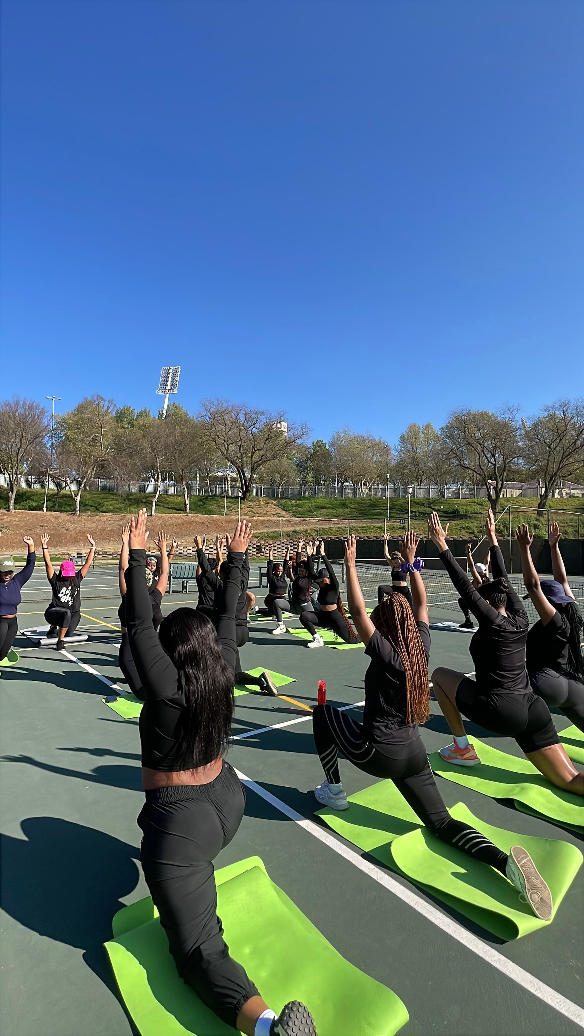 Group lunge session outdoors